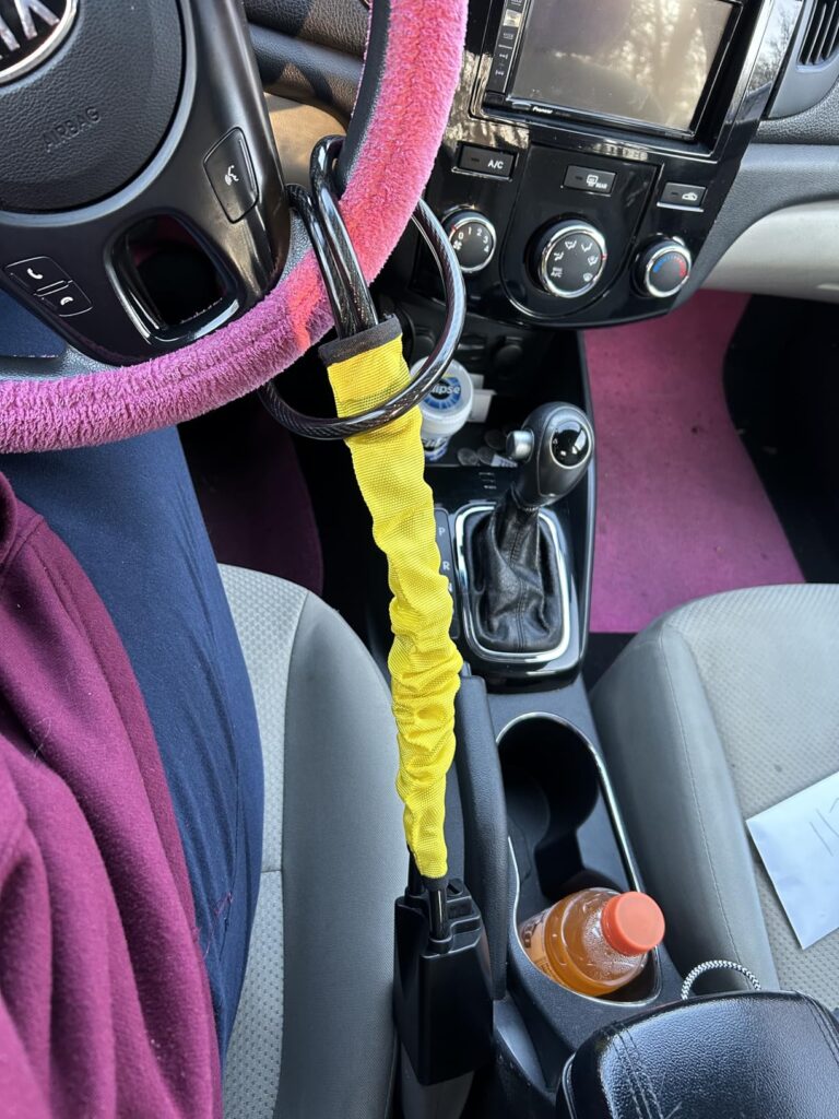 I bought this steering wheel lock for my husband and it works very well. It locks both the steering wheel and seat belt together, making it very difficult for anyone to steal the car. The reinforced steel cable feels very strong, and the PVC coating helps protect it from scratches and rust. It is lightweight, compact, fits different car types, and very easy to use within seconds. Mrs. Femi Lagos ⭐⭐⭐⭐⭐